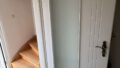 Moderne weiße Designerinnentüren mit Glasteil